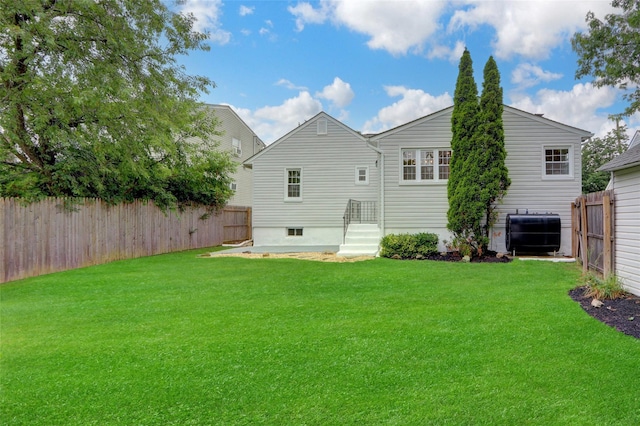 31 Tappan Ave, Babylon, NY 11702 - rear view of house featuring a fenced backyard