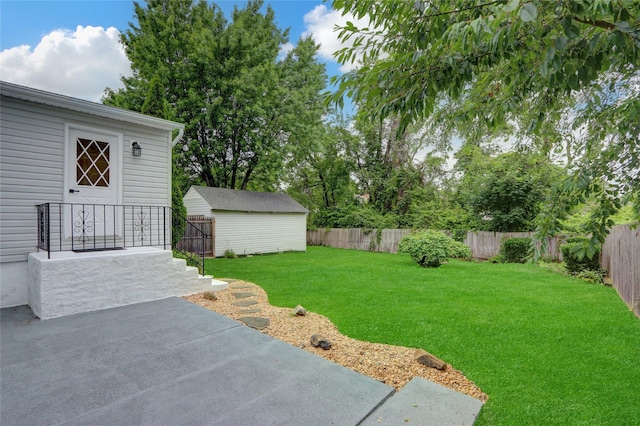 31 Tappan Ave, Babylon, NY 11702 - fenced backyard featuring a patio and an outbuilding