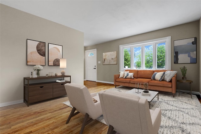 31 Tappan Ave, Babylon, NY 11702 - living area featuring baseboards and light wood finished floors