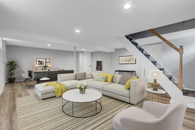 31 Tappan Ave, Babylon, NY 11702 - living area featuring wood finished floors, stairs, and recessed lighting