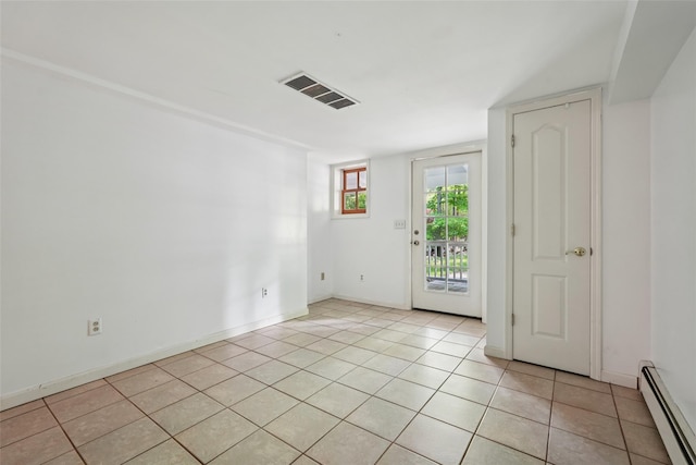 25 Cascade Lake Rd, Warwick, NY 10990 - spare room featuring a baseboard heating unit and light tile patterned floors