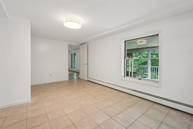 25 Cascade Lake Rd, Warwick, NY 10990 - empty room with baseboard heating and light tile patterned floors