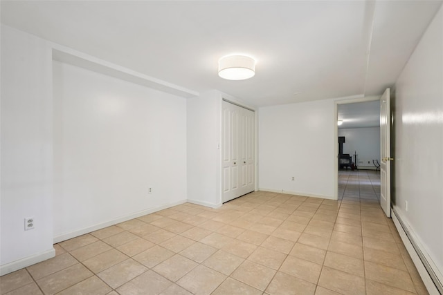 25 Cascade Lake Rd, Warwick, NY 10990 - empty room featuring baseboard heating and light tile patterned flooring