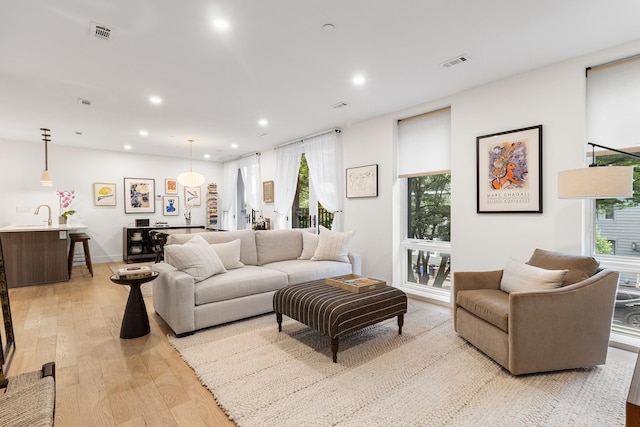 334 22nd St Unit 2B, Brooklyn, NY 11215 - living room featuring light wood finished floors, recessed lighting, and plenty of natural light