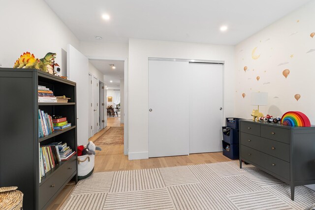 334 22nd St Unit 2B, Brooklyn, NY 11215 - bedroom with light wood-style flooring, a closet, and recessed lighting
