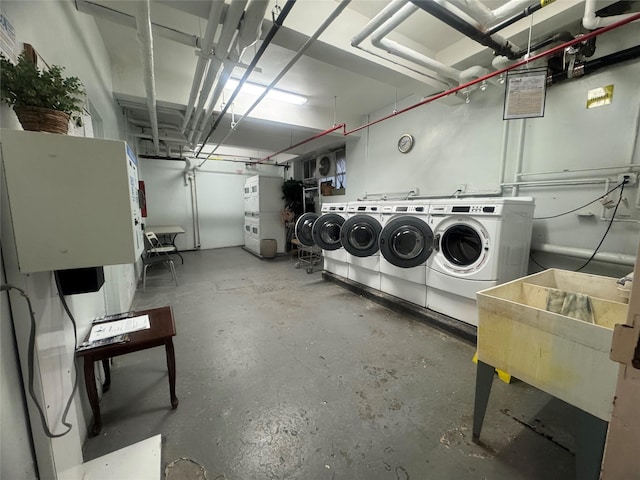 76-26 113th St Unit 2D, Forest Hills, NY 11375 - shared laundry room with washer and clothes dryer and a garage