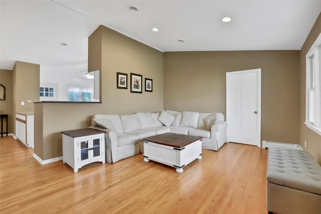 127 Continental Rd, Cornwall, NY 12518 - living room featuring light wood-style flooring, a baseboard radiator, a ceiling fan, and recessed lighting