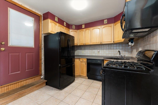3183 Waterbury Ave, Bronx, NY 10465 - kitchen featuring black appliances, light tile patterned flooring, light brown cabinetry, and tasteful backsplash