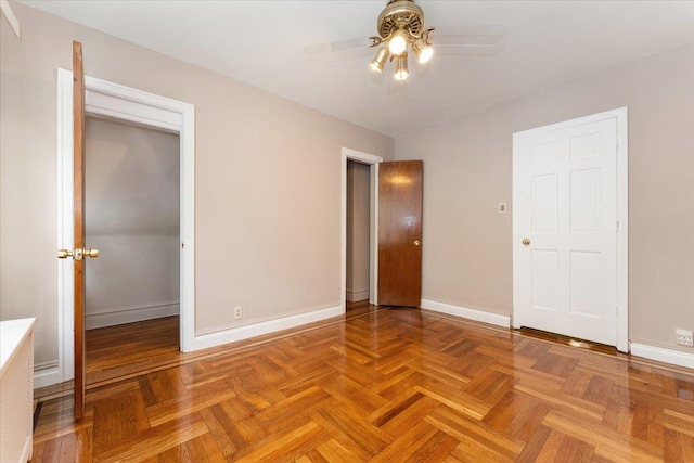 3183 Waterbury Ave, Bronx, NY 10465 - unfurnished bedroom featuring baseboards and a ceiling fan