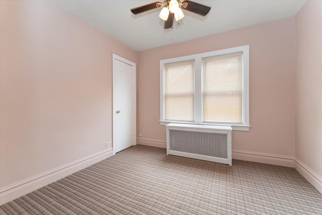 3183 Waterbury Ave, Bronx, NY 10465 - unfurnished room featuring radiator heating unit, a ceiling fan, and light colored carpet