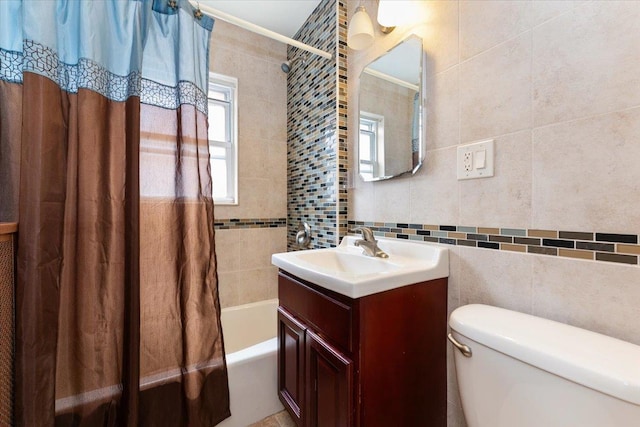 3183 Waterbury Ave, Bronx, NY 10465 - full bath with tile walls, vanity, shower / tub combo with curtain, and tasteful backsplash