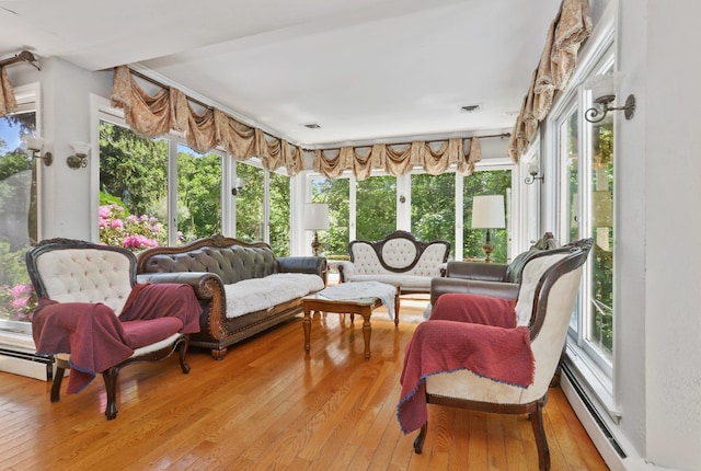 42 N Healy Ave, Hartsdale, NY 10530 - sunroom with a baseboard heating unit and hardwood / wood-style flooring