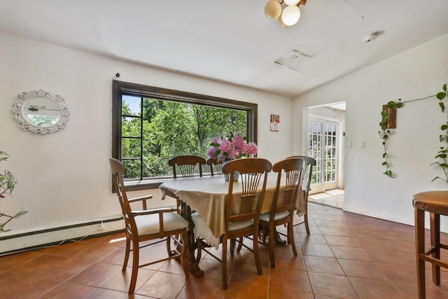 42 N Healy Ave, Hartsdale, NY 10530 - dining area with tile patterned flooring, a baseboard radiator, and lofted ceiling