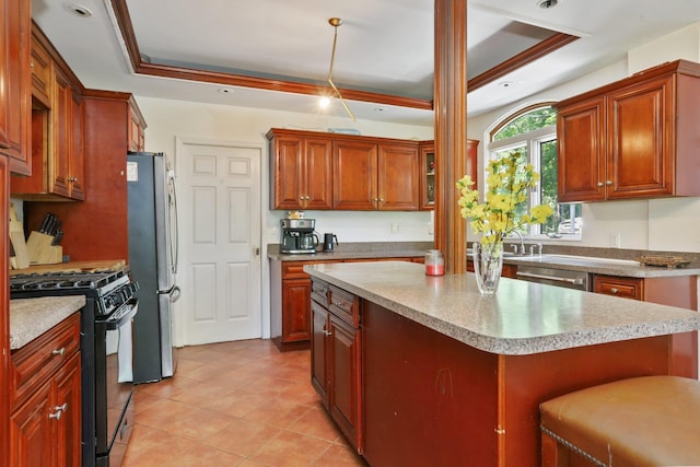 42 N Healy Ave, Hartsdale, NY 10530 - kitchen with stainless steel appliances, a raised ceiling, light countertops, and recessed lighting
