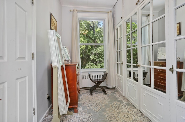 42 N Healy Ave, Hartsdale, NY 10530 - sunroom / solarium featuring french doors and radiator heating unit