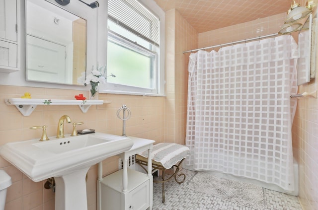 42 N Healy Ave, Hartsdale, NY 10530 - bathroom featuring curtained shower, tile walls, and tile patterned flooring
