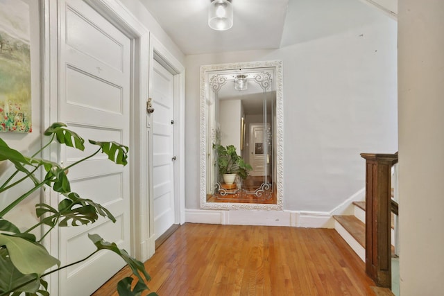 42 N Healy Ave, Hartsdale, NY 10530 - hallway with stairs and light wood-style floors