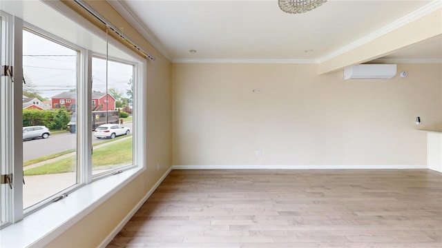 10 Marilyn Ct, West Babylon, NY 11704 - empty room with a wall unit AC, light wood-type flooring, and ornamental molding