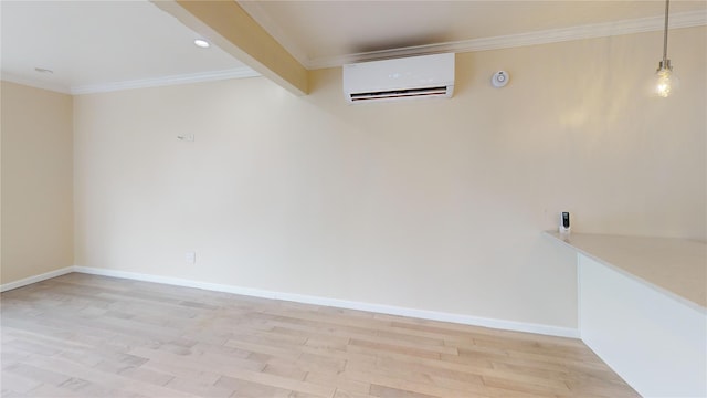 10 Marilyn Ct, West Babylon, NY 11704 - spare room with a wall mounted AC, ornamental molding, light wood finished floors, and recessed lighting