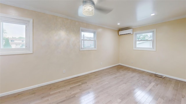 10 Marilyn Ct, West Babylon, NY 11704 - empty room featuring a wall unit AC, hardwood / wood-style flooring, crown molding, and ceiling fan