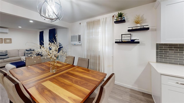 10 Marilyn Ct, West Babylon, NY 11704 - dining room with light wood-style floors and recessed lighting