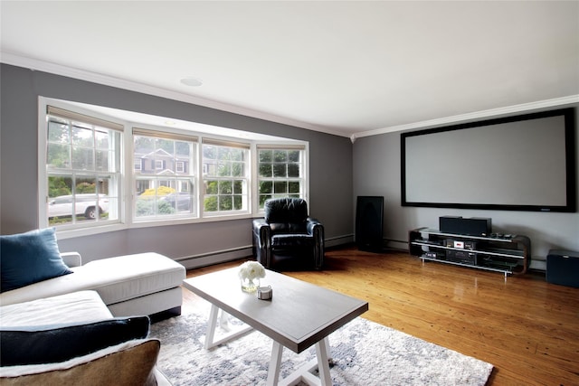 20 Primrose Ln, East Hills, NY 11577 - cinema room featuring crown molding, a baseboard heating unit, and wood finished floors