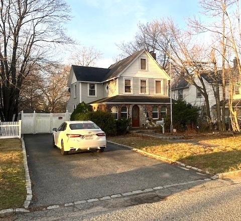 30 Arnold Ave, West Babylon, NY 11704 - view of front of property featuring stone siding