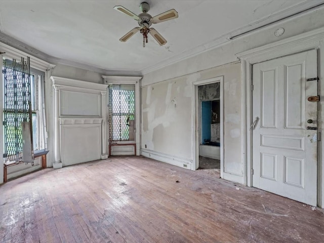 1269 Bergen St Hse, Unit Hse, Brooklyn, NY 11213 - unfurnished living room featuring ceiling fan, wood finished floors, and ornamental molding