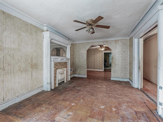 1269 Bergen St Hse, Unit Hse, Brooklyn, NY 11213 - unfurnished living room featuring a ceiling fan, a fireplace, ornamental molding, and a textured ceiling