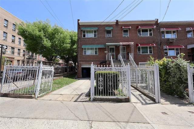 3722 Bronxwood Ave, Bronx, NY 10469 - multi unit property with a fenced front yard, brick siding, and a gate