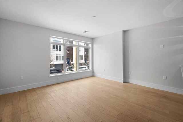 160 Bch 5th St, Far Rockaway, NY 11691 - empty room with hardwood / wood-style floors and baseboards
