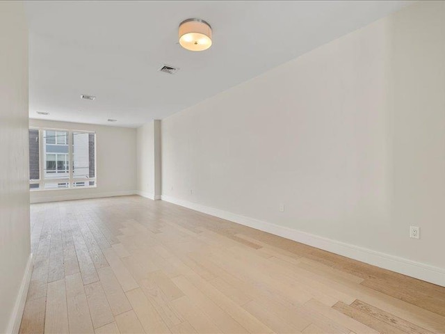 160 Bch 5th St, Far Rockaway, NY 11691 - unfurnished room featuring light wood-style flooring and baseboards