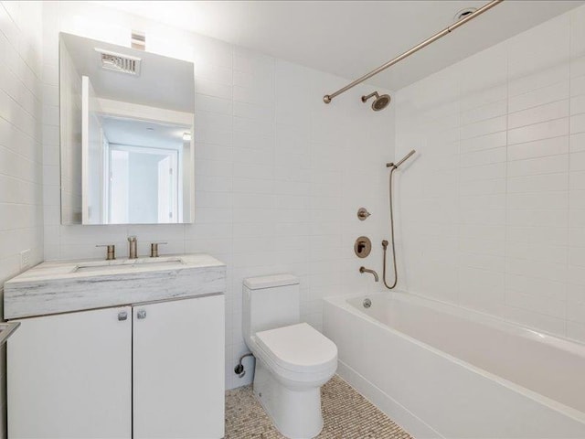 160 Bch 5th St, Far Rockaway, NY 11691 - full bath featuring vanity, tile walls,  shower combination, and tile patterned floors