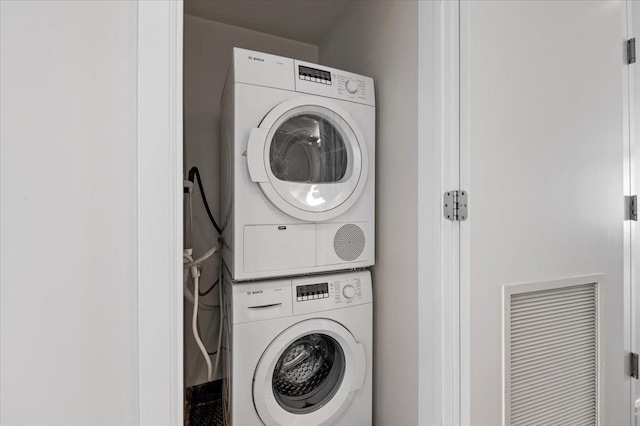 160 Bch 5th St, Far Rockaway, NY 11691 - washroom featuring stacked washer and clothes dryer