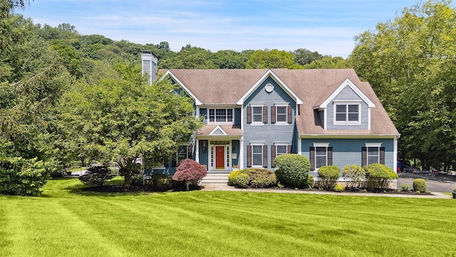 64 Lambert Rdg, Cross River, NY 10518 - colonial-style house with a front lawn and a chimney