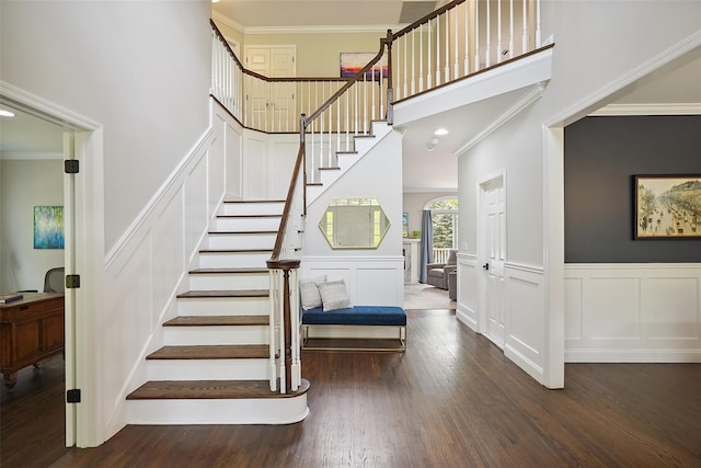 64 Lambert Rdg, Cross River, NY 10518 - staircase with a decorative wall, crown molding, wood finished floors, and a towering ceiling