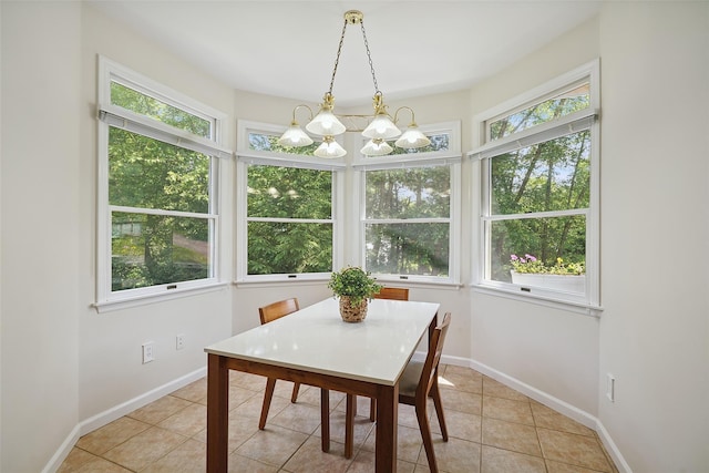64 Lambert Rdg, Cross River, NY 10518 - dining space with light tile patterned flooring and a chandelier