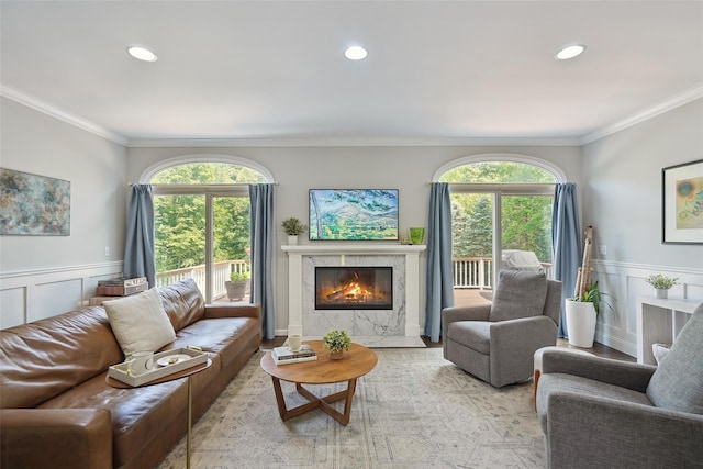 64 Lambert Rdg, Cross River, NY 10518 - living area featuring ornamental molding, a high end fireplace, a decorative wall, plenty of natural light, and a wainscoted wall