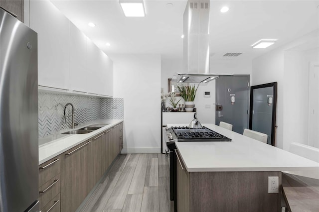 2222 Ocean Ave Ph-B, Ph-B Brooklyn, NY 11229 - kitchen featuring appliances with stainless steel finishes, modern cabinets, a kitchen island, light countertops, and recessed lighting