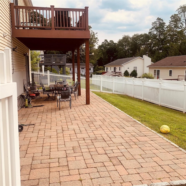 5 Sabrina Ln, Ossining, NY 10562 - fenced backyard featuring a patio and outdoor dining space