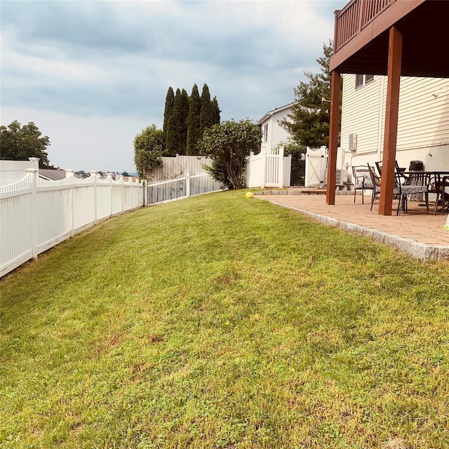 5 Sabrina Ln, Ossining, NY 10562 - fenced backyard with a patio area and a gate