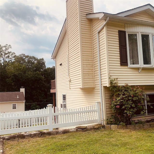 5 Sabrina Ln, Ossining, NY 10562 - view of home's exterior featuring a chimney
