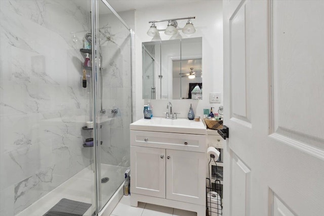 710 E 213th St, Bronx, NY 10467 - bathroom with a marble finish shower, vanity, and a ceiling fan