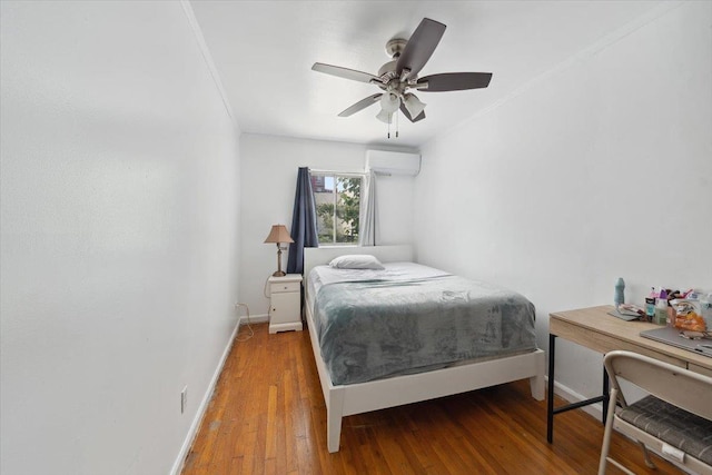 710 E 213th St, Bronx, NY 10467 - bedroom with a wall mounted air conditioner, hardwood / wood-style flooring, ceiling fan, and ornamental molding