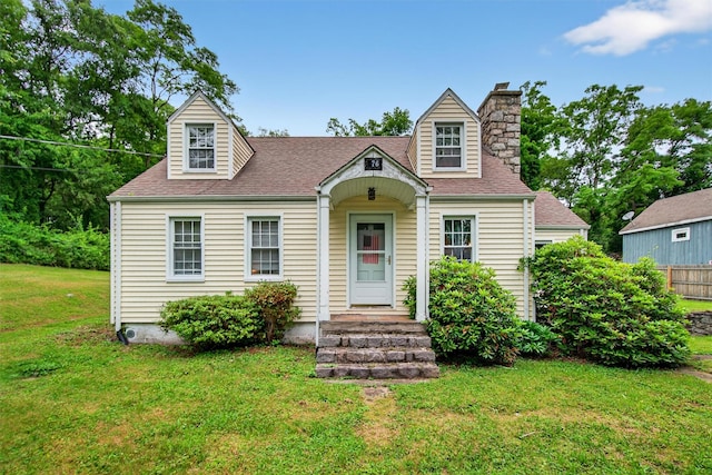 5776 Albany Post Rd, Cortlandt Manor, NY 10567 - view of front of property with a front yard, a chimney, and a shingled roof