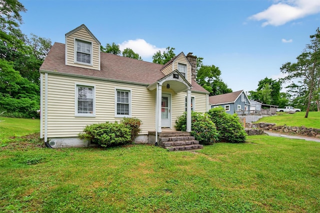 5776 Albany Post Rd, Cortlandt Manor, NY 10567 - view of front of home with a front lawn, a chimney, and a shingled roof