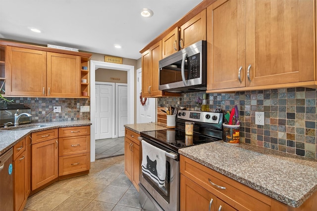 5776 Albany Post Rd, Cortlandt Manor, NY 10567 - kitchen with stainless steel appliances, open shelves, brown cabinetry, backsplash, and recessed lighting