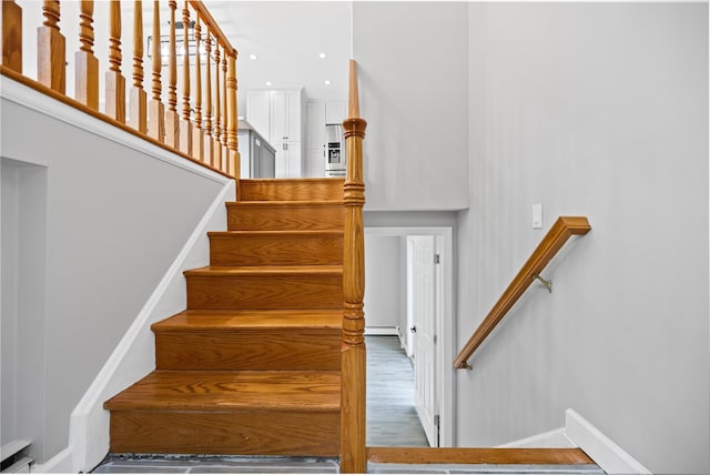 11 Trescott St, Dix Hills, NY 11746 - stairway with wood finished floors and recessed lighting