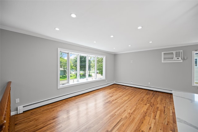 11 Trescott St, Dix Hills, NY 11746 - empty room featuring ornamental molding, a baseboard radiator, recessed lighting, light wood-style floors, and an AC wall unit