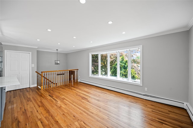 11 Trescott St, Dix Hills, NY 11746 - empty room with ornamental molding, light wood-type flooring, a baseboard heating unit, recessed lighting, and a chandelier